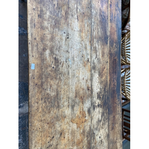 141 - A Victorian pine farmhouse kitchen table with single drawer - approx. 74cm high x 105cm wide x 228cm... 