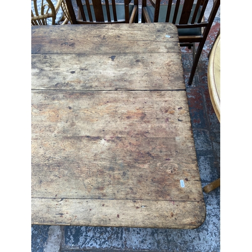 141 - A Victorian pine farmhouse kitchen table with single drawer - approx. 74cm high x 105cm wide x 228cm... 