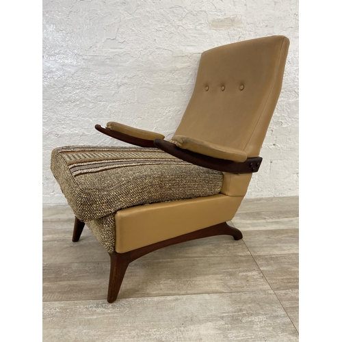 143 - A mid 20th century Greaves & Thomas teak, tan vinyl and brown fabric upholstered armchair - approx. ... 