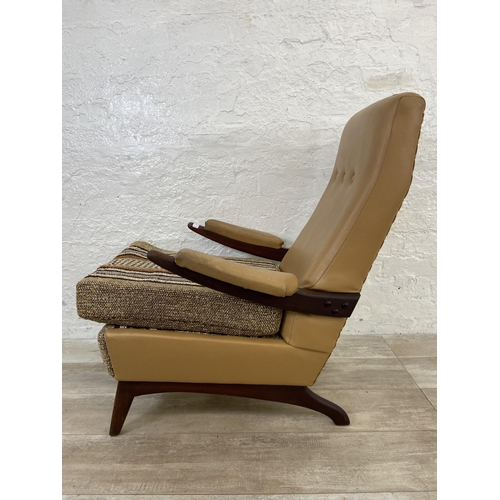 143 - A mid 20th century Greaves & Thomas teak, tan vinyl and brown fabric upholstered armchair - approx. ... 