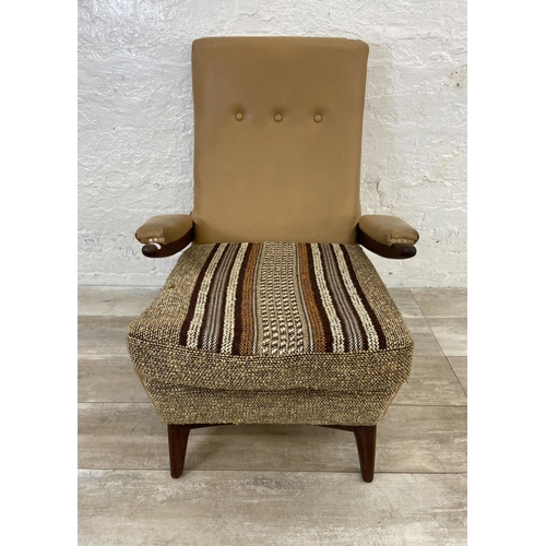 143 - A mid 20th century Greaves & Thomas teak, tan vinyl and brown fabric upholstered armchair - approx. ... 