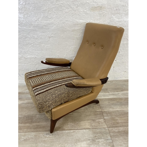 143 - A mid 20th century Greaves & Thomas teak, tan vinyl and brown fabric upholstered armchair - approx. ... 