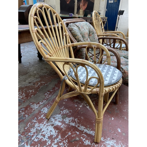 145 - Three wicker and cane armchairs