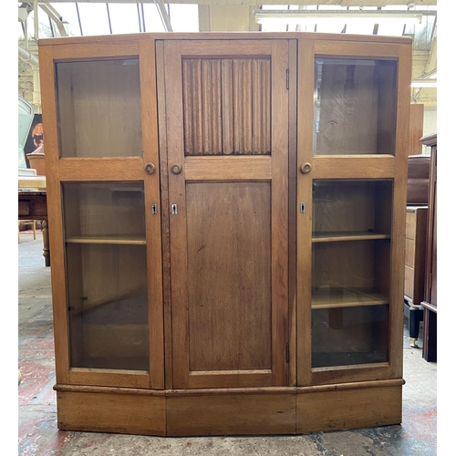 147 - A mid 20th century Bowman Bros Ltd of Camden Town London carved oak linenfold bookcase - approx. 117... 