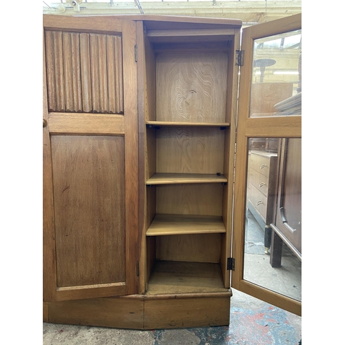 147 - A mid 20th century Bowman Bros Ltd of Camden Town London carved oak linenfold bookcase - approx. 117... 