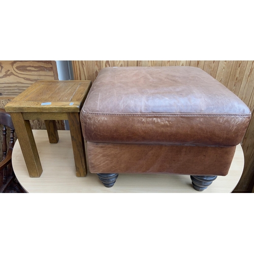 149 - Two pieces of modern furniture, one oak side table and one brown leather footstool