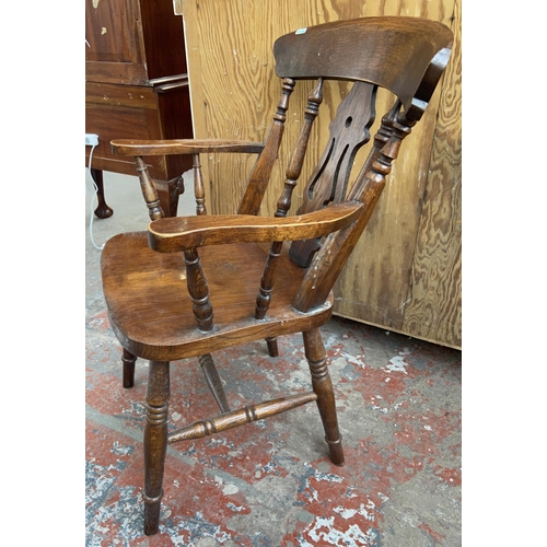 151 - Three chairs, two Victorian style oak farmhouse carver dining chairs and one Victorian elm and beech... 