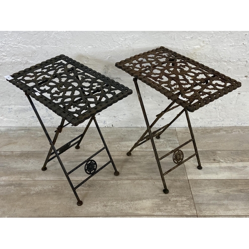 154 - A pair of Victorian style cast metal folding garden tables - approx. 50cm high x 28cm wide x 48cm lo... 