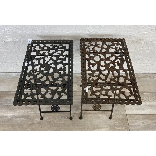 154 - A pair of Victorian style cast metal folding garden tables - approx. 50cm high x 28cm wide x 48cm lo... 