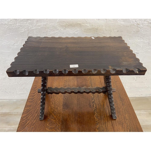 156 - Two side tables, one early/mid 20th century oak drop leaf and one adzed hardwood - largest approx. 5... 