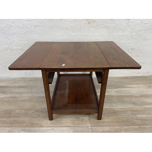 156 - Two side tables, one early/mid 20th century oak drop leaf and one adzed hardwood - largest approx. 5... 