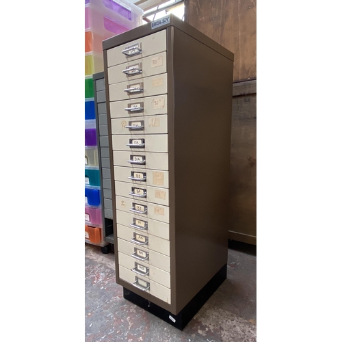 158 - A Bisley brown and cream metal fifteen drawer office filing cabinet - approx. 94cm high x x28cm wide... 