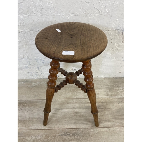 159 - A Victorian elm circular top bobbin turned stool - approx. 50cm high x 28cm diameter