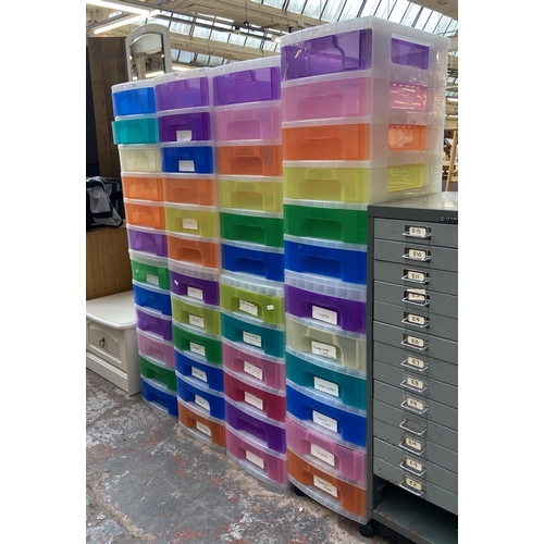 160 - Eight multicoloured plastic six drawer filing cabinets - approx. 67cm high x 31cm wide x 42cm deep