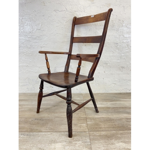 164 - A Victorian elm and beech ladder back farmhouse armchair - approx. 108cm high x 58cm wide x 47cm dee... 