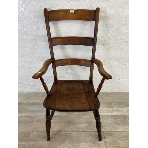 164 - A Victorian elm and beech ladder back farmhouse armchair - approx. 108cm high x 58cm wide x 47cm dee... 