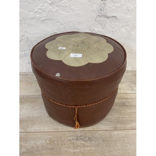 167 - A mid 20th century brown and cream vinyl circular footstool - approx. 29cm high x 36cm diameter