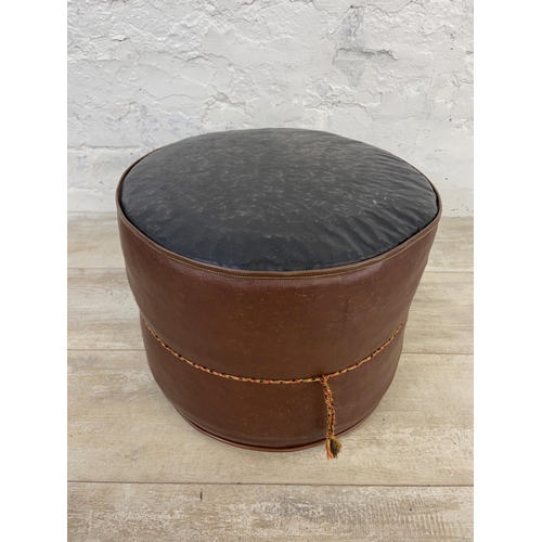 167 - A mid 20th century brown and cream vinyl circular footstool - approx. 29cm high x 36cm diameter