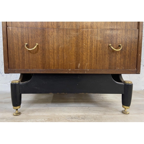 168 - Two mid 20th century G Plan Librenza tola and ebonised chest of drawers - largest approx. 129cm high... 