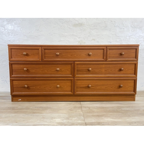 170 - A G Plan teak chest of drawers - approx. 69cm high x 150cm wide x 46cm deep