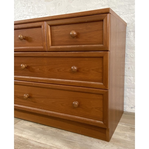 170 - A G Plan teak chest of drawers - approx. 69cm high x 150cm wide x 46cm deep