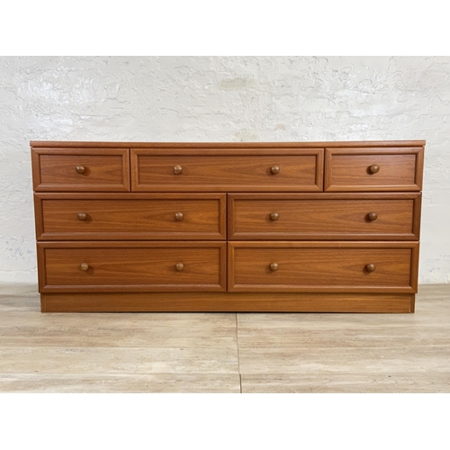 172 - A G Plan teak chest of drawers - approx. 69cm high x 150cm wide x 46cm deep