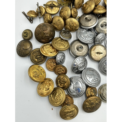 2387B - A collection of military buttons