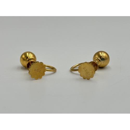 2212 - A pair of antique 9ct gold orb screw earrings - approx. gross weight 1.45g