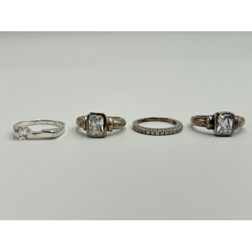 2222 - Four .925 silver CZ set dress rings - approx. gross weight 13g