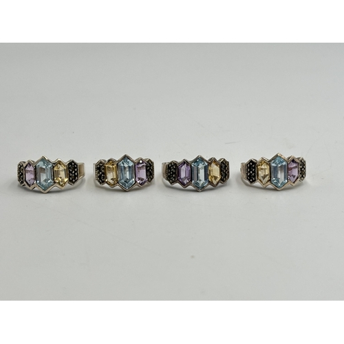 2243 - Four .925 silver multi-gemstone dress rings - approx. gross weight 17.5g