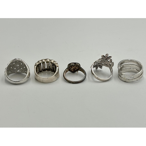 2245 - Five .925 silver dress rings, three CZ and two marcasite - approx. gross weight 30g