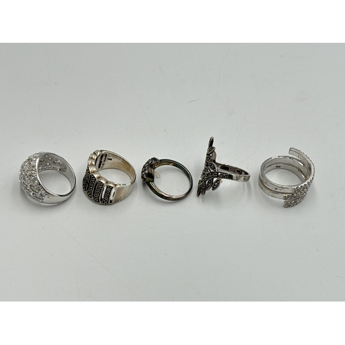 2245 - Five .925 silver dress rings, three CZ and two marcasite - approx. gross weight 30g