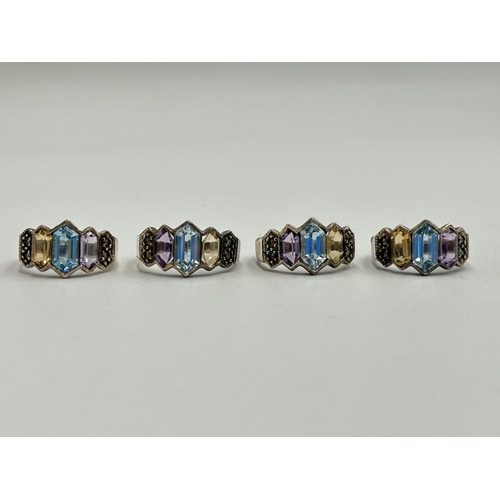 2247 - Four .925 silver multi-gemstone dress rings - approx. gross weight 18g