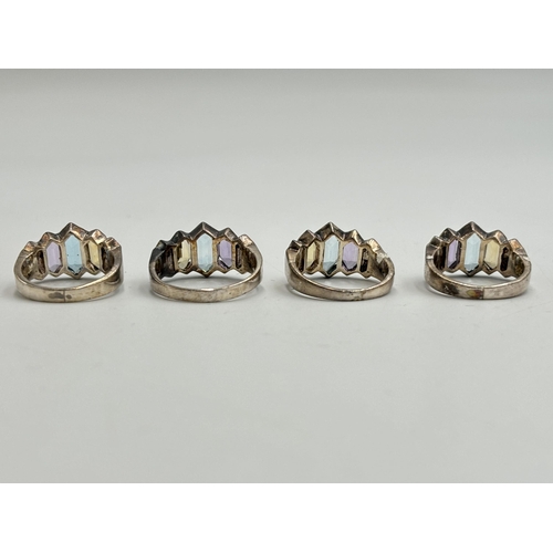 2247 - Four .925 silver multi-gemstone dress rings - approx. gross weight 18g