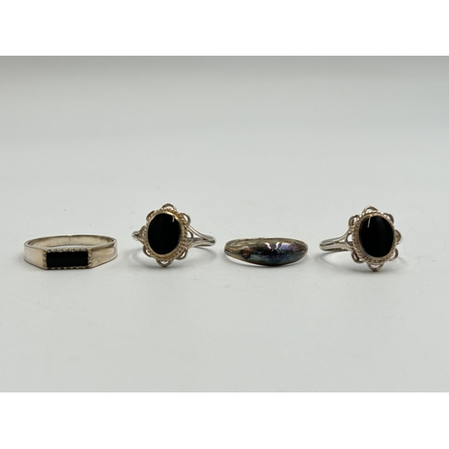 2248 - Four .925 silver dress rings to include three black onyx etc. - approx. gross weight 6.5g