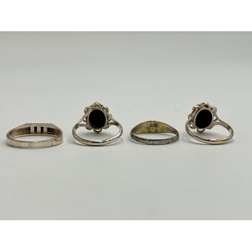 2248 - Four .925 silver dress rings to include three black onyx etc. - approx. gross weight 6.5g