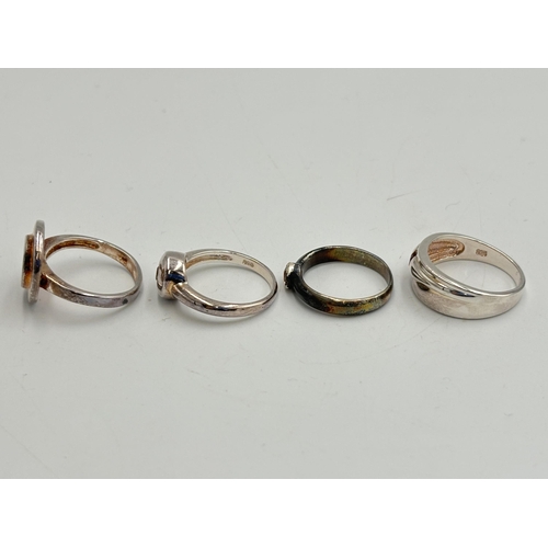 2250 - Four .925 silver gemstone set dress rings to include mother of pearl, citrine etc. - approx. gross w... 