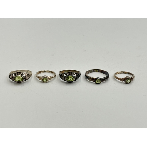 2256 - Five .925 silver peridot set dress rings - approx. gross weight 10.4g