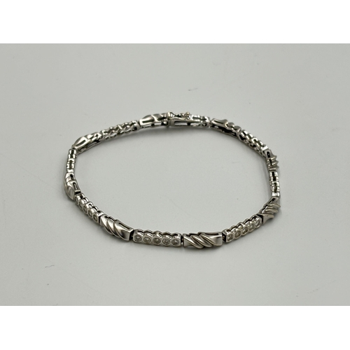 A hallmarked 18ct white gold diamond set bracelet - approx. gross weight 9.9g and 18cm long