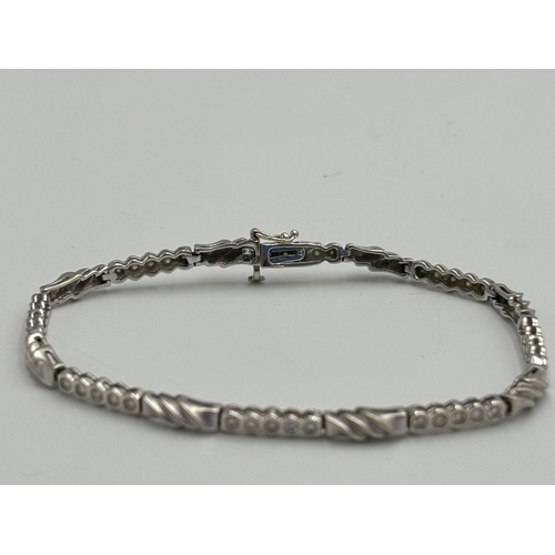 2259A - A hallmarked 18ct white gold diamond set bracelet - approx. gross weight 9.9g and 18cm long