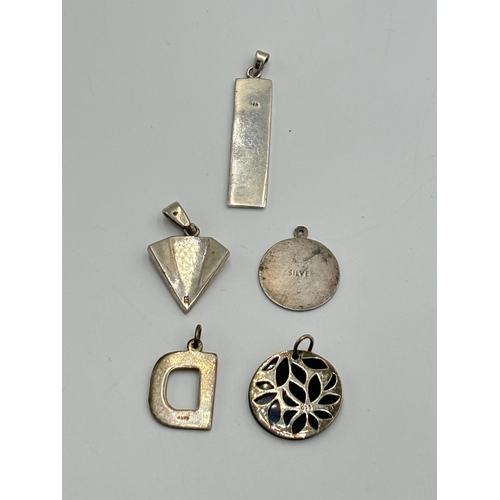 2259I - Five .925 silver pendants to include mother of pearl, St. Christopher etc. - approx. gross weight 19... 