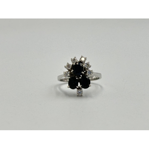 2259Q - An 18ct white gold sapphire and diamond ring, size O - approx. gross weight 4.3g