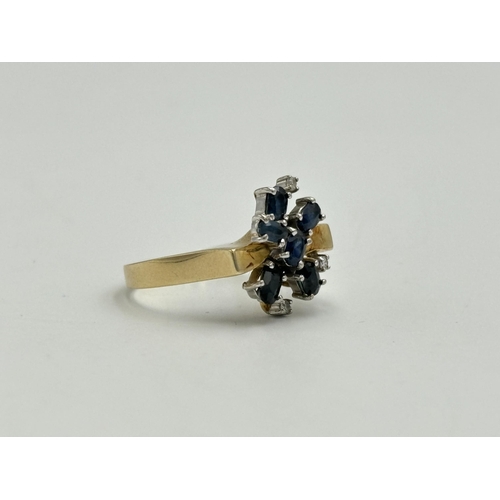 2259T - A 14ct gold sapphire and diamond cluster ring, size O - approx. gross weight 3.8g