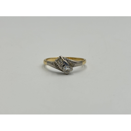 2259Y - An 18ct gold and platinum diamond two stone ring, size O - approx. gross weight 2.5g