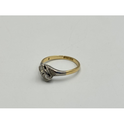 2259Y - An 18ct gold and platinum diamond two stone ring, size O - approx. gross weight 2.5g