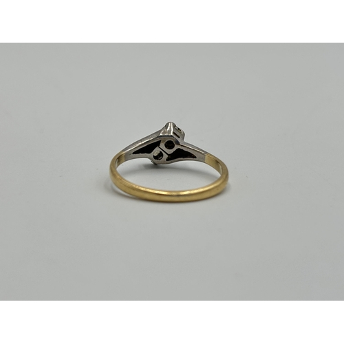 2259Y - An 18ct gold and platinum diamond two stone ring, size O - approx. gross weight 2.5g