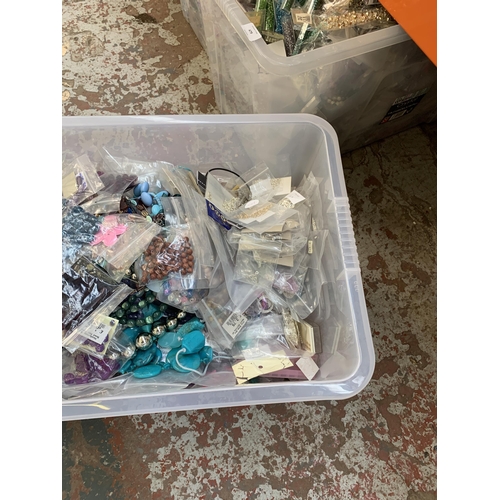 478 - A box containing a large collection of costume jewellery, beads and jewellery making accessories