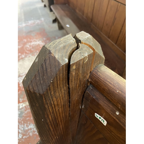 127 - A Victorian pitch pine church pew - approx. 92cm high x 185cm wide x 38cm deep