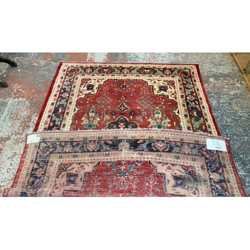 6 - A 20th century Iranian hand knotted rug - approx. 270cm x 186cm