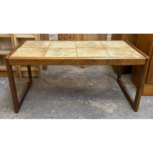 50A - A mid 20th century teak and ceramic tiled top coffee table